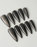 Black Cat-eye custom press-on nails — available in multiple shapes and sizes