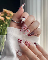 KT Cake press-on nails in S medium almond with glossy cake-inspired accent details