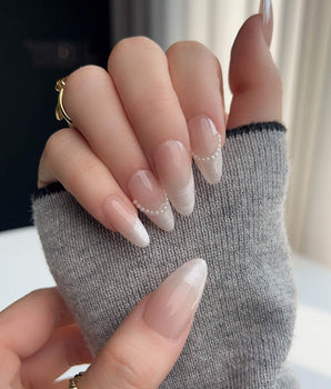 Nude French Tip Nails - Dew Sparkle handmade press-on nails featuring Pearly French, Silk Texture & Pearls.