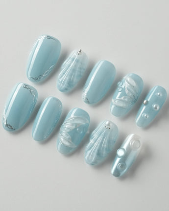 Mermaid Nail Designs Tale salon-style press-ons with handmade coastal details