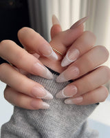 Dew Sparkle press-on nails with soft nude French tips and pearly silk-like shine