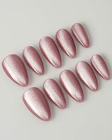 Soft Romance nail art close-up showing rose pink cat eye magnetic shimmer nails details
