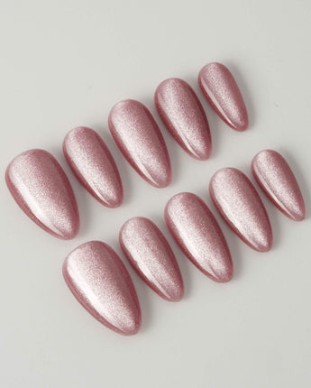 Soft Romance nail art close-up showing rose pink cat eye magnetic shimmer nails details