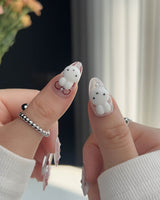Miss Miffy press-on nails with fall-inspired handmade nail art