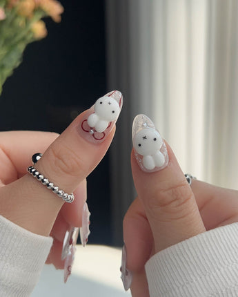 Miss Miffy press-on nails with fall-inspired handmade nail art