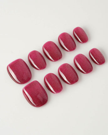 Fuchsia Cat-eye custom press-on nails — available in multiple shapes and sizes