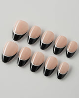 Classic Return - Ebony nails with glossy black tips, nude pink base, and crisp white line