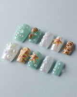 Mauritius Escape beach manicure with 3D starfish, conch shells, and water bubbles