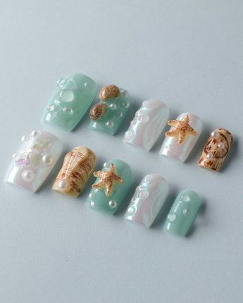 Mauritius Escape beach manicure with 3D starfish, conch shells, and water bubbles
