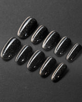 Black Cat-eye handmade press-on nails featuring black cat eye