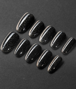 Black Cat-eye handmade press-on nails featuring black cat eye