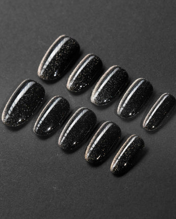 Black Cat-eye handmade press-on nails featuring black cat eye