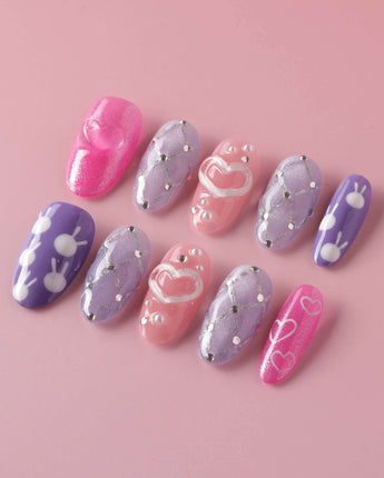 Charming Glam Usagi medium oval nails with polished custom art and sweet character mood