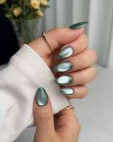 Mint Orb nail art close-up showing Glacier Green Cat Eye details