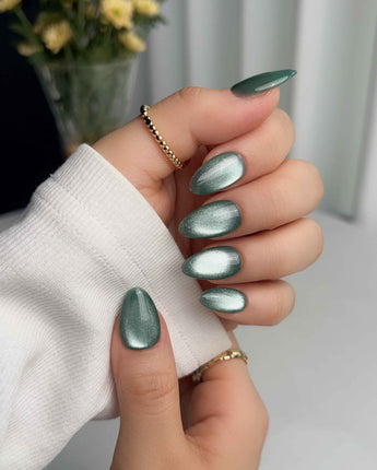 Mint Orb nail art close-up showing Glacier Green Cat Eye details