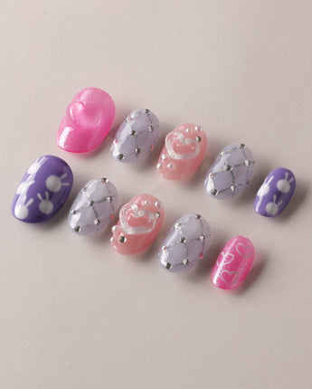 Charming Glam Usagi extra short oval nails with playful glam details and glossy gel polish