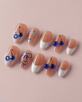 Klein Blue Cherry hand-painted press-on nails with elegant summer French tip styling