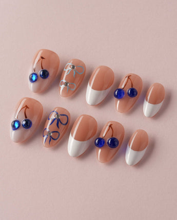 Klein Blue Cherry hand-painted press-on nails with elegant summer French tip styling