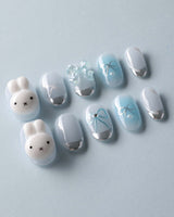 Miffy Summer close-up of 3D bunny bow accents, baby blue tips, and silver details
