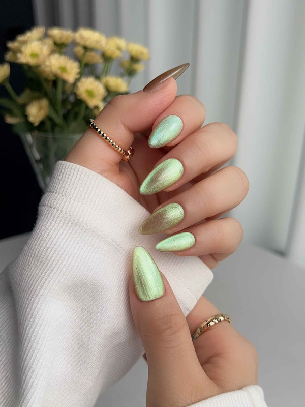 Aurora Mist handmade press-on nails featuring Champagne Nude, Green Aurora Cat Eye.