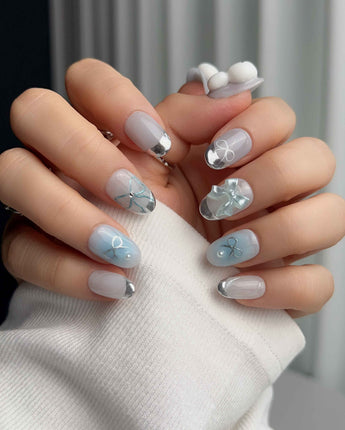 Miffy Summer handmade nails with bunny bow detail, silver tips, and clean pastel styling