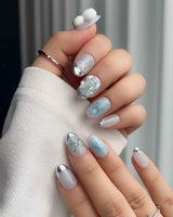 Miffy Summer short oval nails with baby blue white French mix, silver tips, bunny bow, and 3D accents