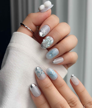 Miffy Summer handmade press-on nails featuring baby blue white mix french silver tip bunny bow 3D accents clean cute design