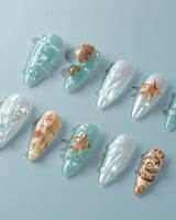 Mauritius Escape ocean-inspired press-on nails with iridescent white and mint gel