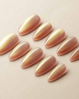 Aurora Flame handmade press-on nails featuring orange & gold cat eye