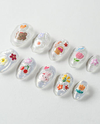 Squishy Pop extra short almond nails with vibrant squishy-pop inspired details