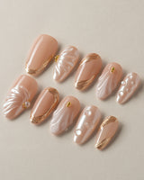 Venus hand-painted pearly shell press-on nails with soft romantic shine
