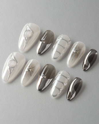 Silver Flame nail art close-up showing silver chrome metallic 3D sculpted nails details