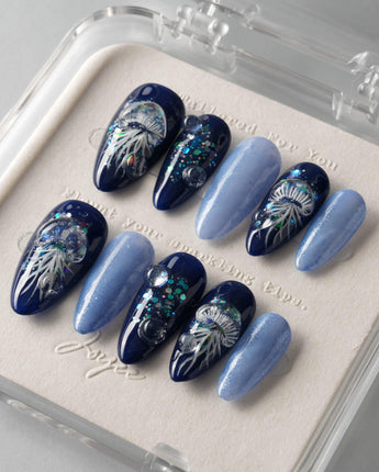 Glow Jellyfish Nails medium almond nails with floating jellyfish nail design