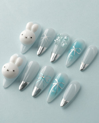 Miffy Summer close-up of silver-tipped pastel nails with playful bunny-inspired detail