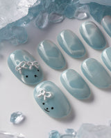 Thump Bunny_Macaron short oval nails with ice blue magnetic cat eye hearts and bunny detail