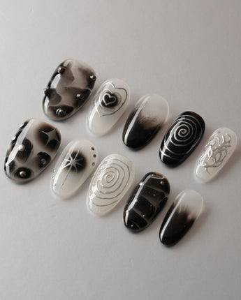 Black & Silver Void custom press-on nails — available in multiple shapes and sizes