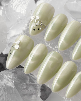 Thump Bunny_Mint handmade press-on nails featuring Sage Green, Velvet Cat Eye Bow.