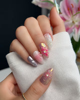 Gem Blossom nail art close-up showing pastel mix design chrome iridescent flower pearl butterfly 3D accents details