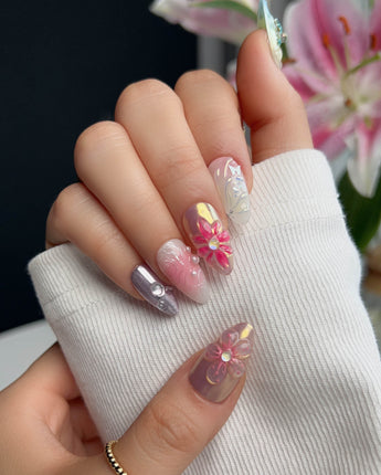 Gem Blossom nail art close-up showing pastel mix design chrome iridescent flower pearl butterfly 3D accents details