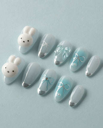 Miffy Summer short oval press-ons with baby blue accents and polished cute design