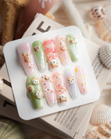 My Lulu cat nail art press-on nails with cozy pink and green studio-cat theme