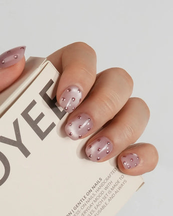Rose Bead soft pink press-on nails with rose metallic beads like frozen droplets