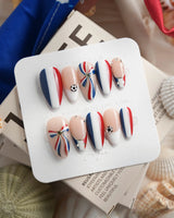 FIFA France World Cup 2026 nails with diagonal tricolor stripes, crystals, and soccer charms