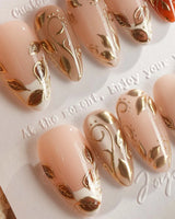 Falling leaves press-on nails with caramel autumn tones, 3D gold leaves and vine details