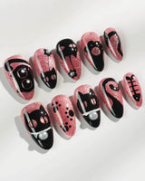 Night Prowler nail art close-up showing dusty pink black cat hand-painted 3D details nails details