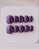 Purple Cat-Eye nail art close-up showing Dusty Purple cat eye details