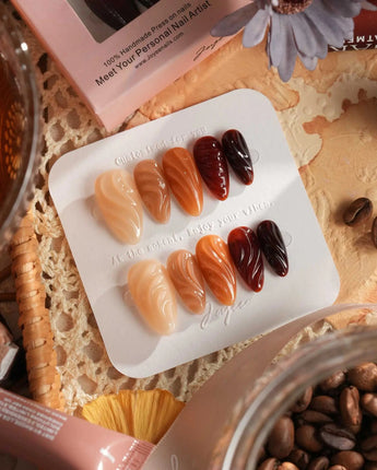 The whole fall nail art close-up showing Amber & Caramel Gradient, 3D Water Ripple Syrup Style. details