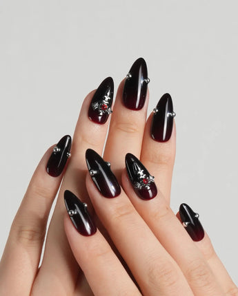 The Curse press-on nails — red to black gradient
