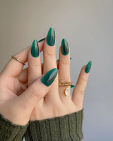 Emerald Green Nail Designs Cat-eye Nails nail art close-up showing emerald green cat eye nails details