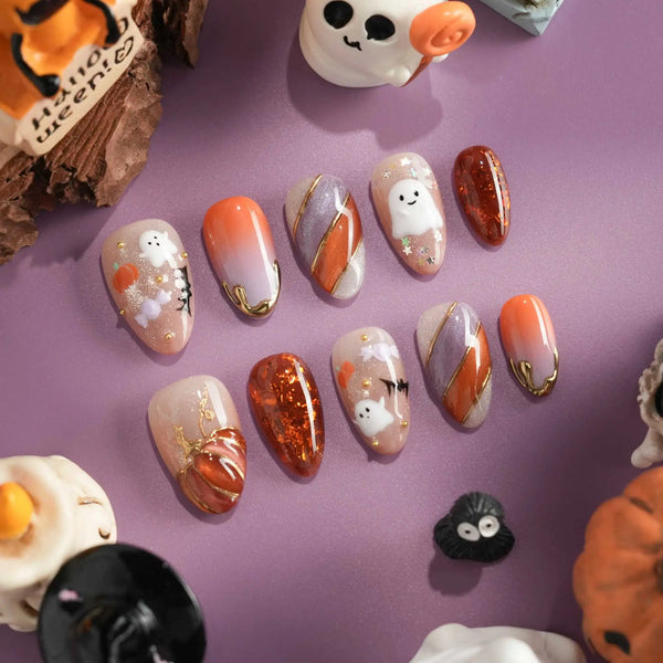 Halloween ghost and pumpkin nails in orange and purple